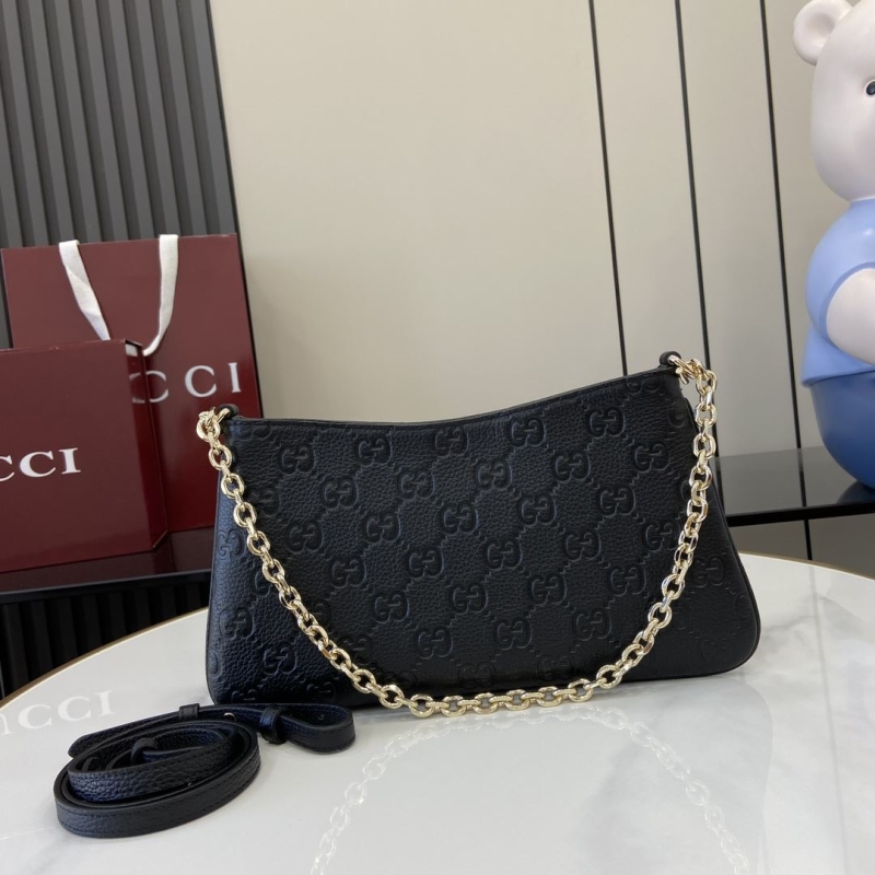 G*u*i top handle bags